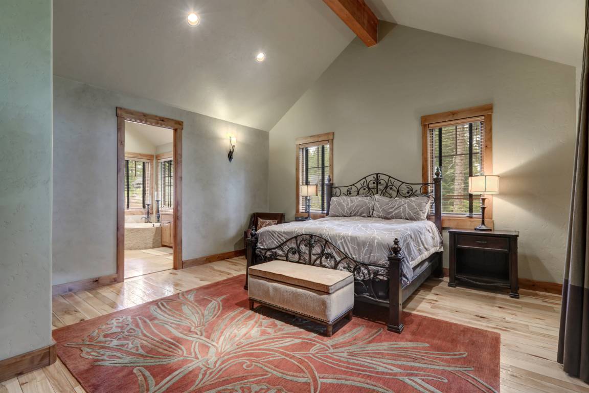 Large Master Bedroom Interior With Grey Plaster Venetian Wall Finish